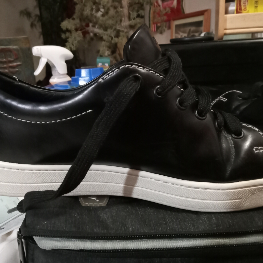 Prada Black Sneakers with Glossy Finish and Metallic Accents - Picture 2 of 7